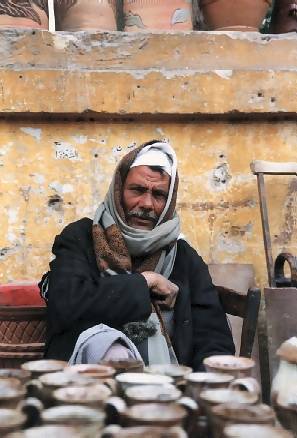 a man with pots